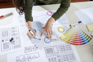 woman creating logo design for company